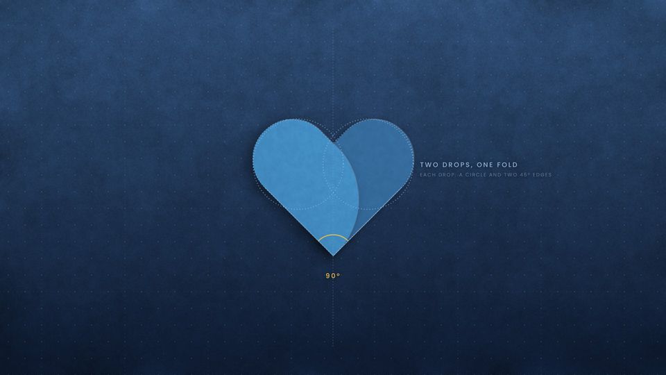 A blue paper heart drawn with construction lines